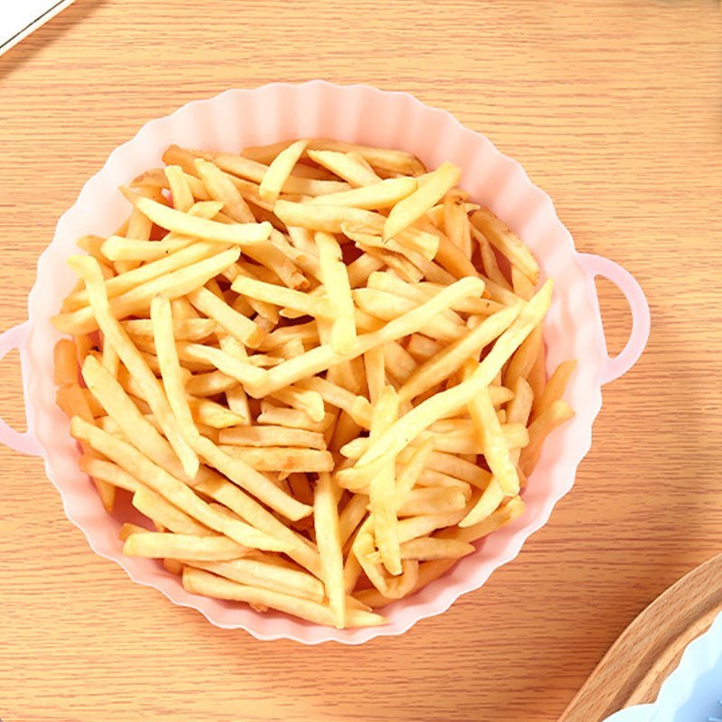 Original Airfryer Silikonform, wiederverwendbar. Macht die Reinigung nach dem Kochen spielend leicht.