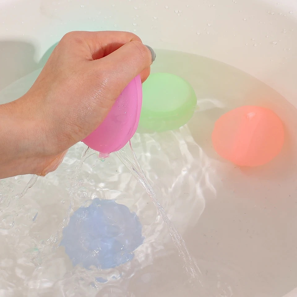 Set bunter, wiederverwendbarer Wasserbomben bereit für endlosen Sommerspaß. Umweltfreundliches Wasserspielzeug für alle Altersgruppen.