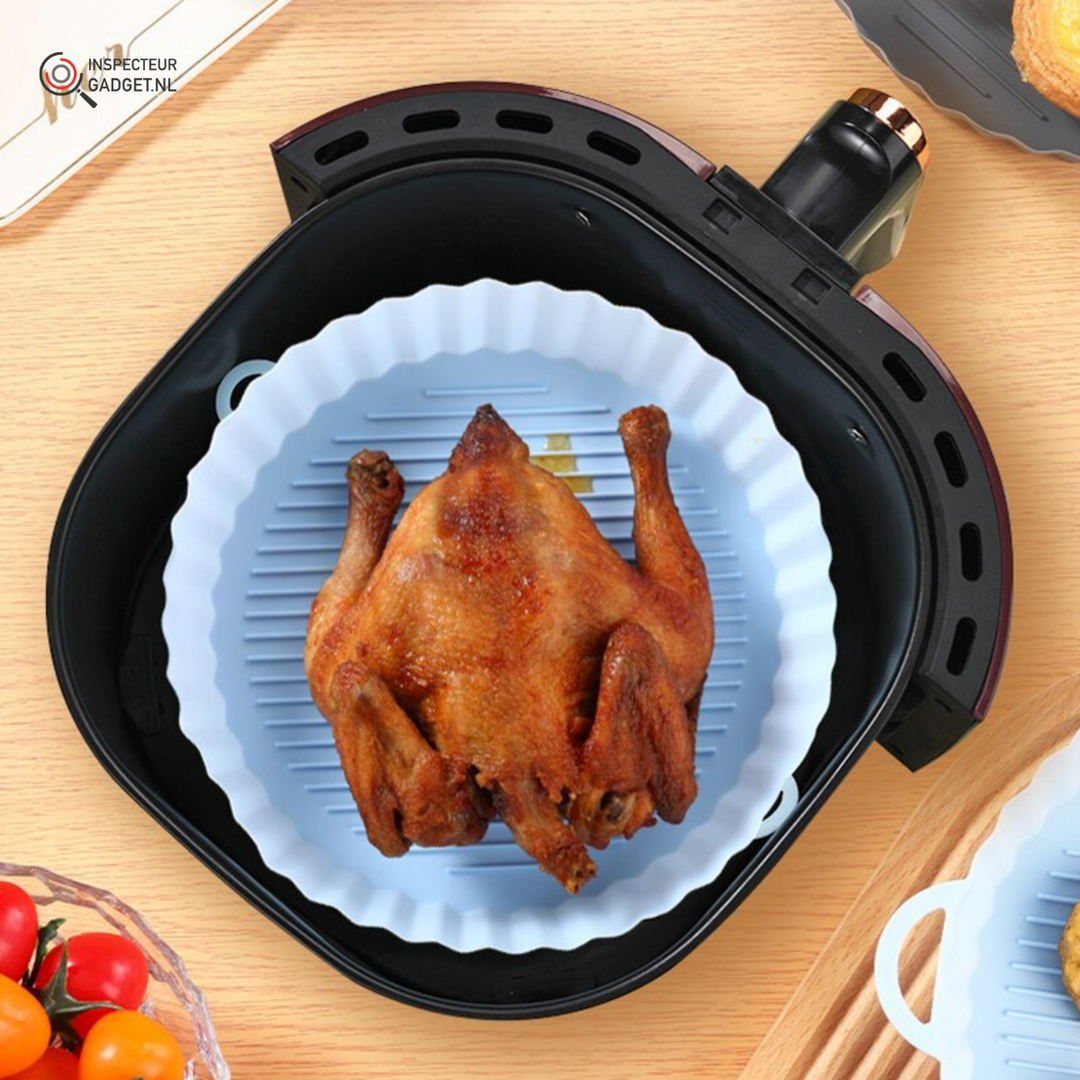 Wiederverwendbarer Airfryer Silikonkorb für sauberes, fettfreies Kochen; spülmaschinenfest & hitzebeständig.